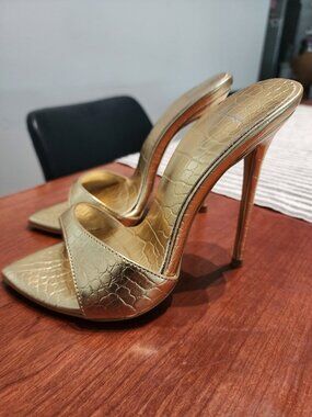 Gold stiletto designer shoes